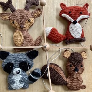 crocheted flat forest animals: reindeer, fox, raccoon, squirrel