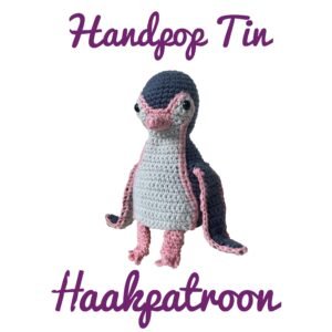 crocheted penguin hand puppet